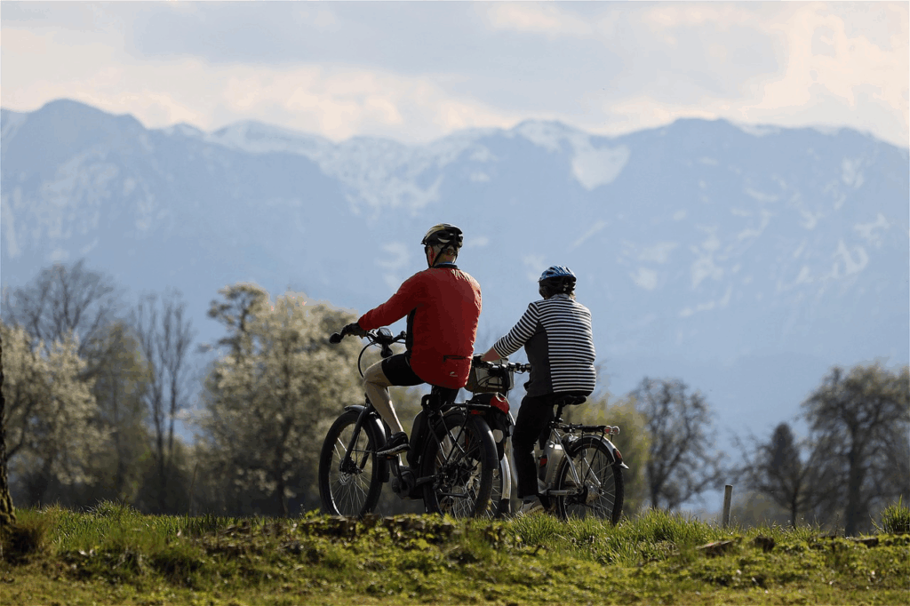 Seniors riding bikes for exercise in the mountains